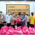 Ringankan Beban Masyarakat, Tekiro Tools bekerjasama dengan Polsek Metro Penjaringan bagikan Ribuan Paket Sembako