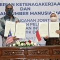 RI-Malaysia Tandatangani Kerja Sama Pelindungan Pekerja Migran di Malaysia